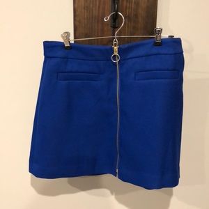 Blue mini skirt. Never been worn.